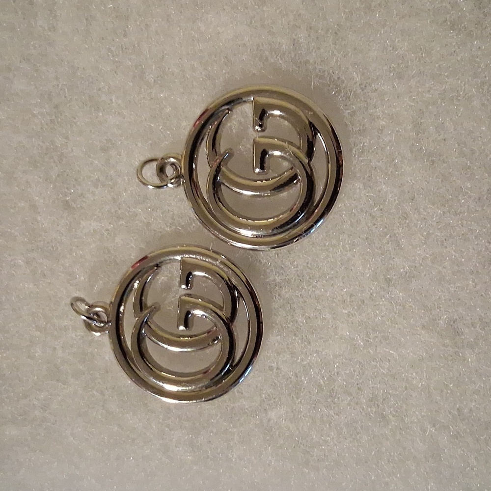 2 Silver GG Charms